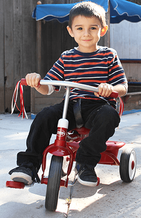 AJ's Day Care Kid on a Tricycle